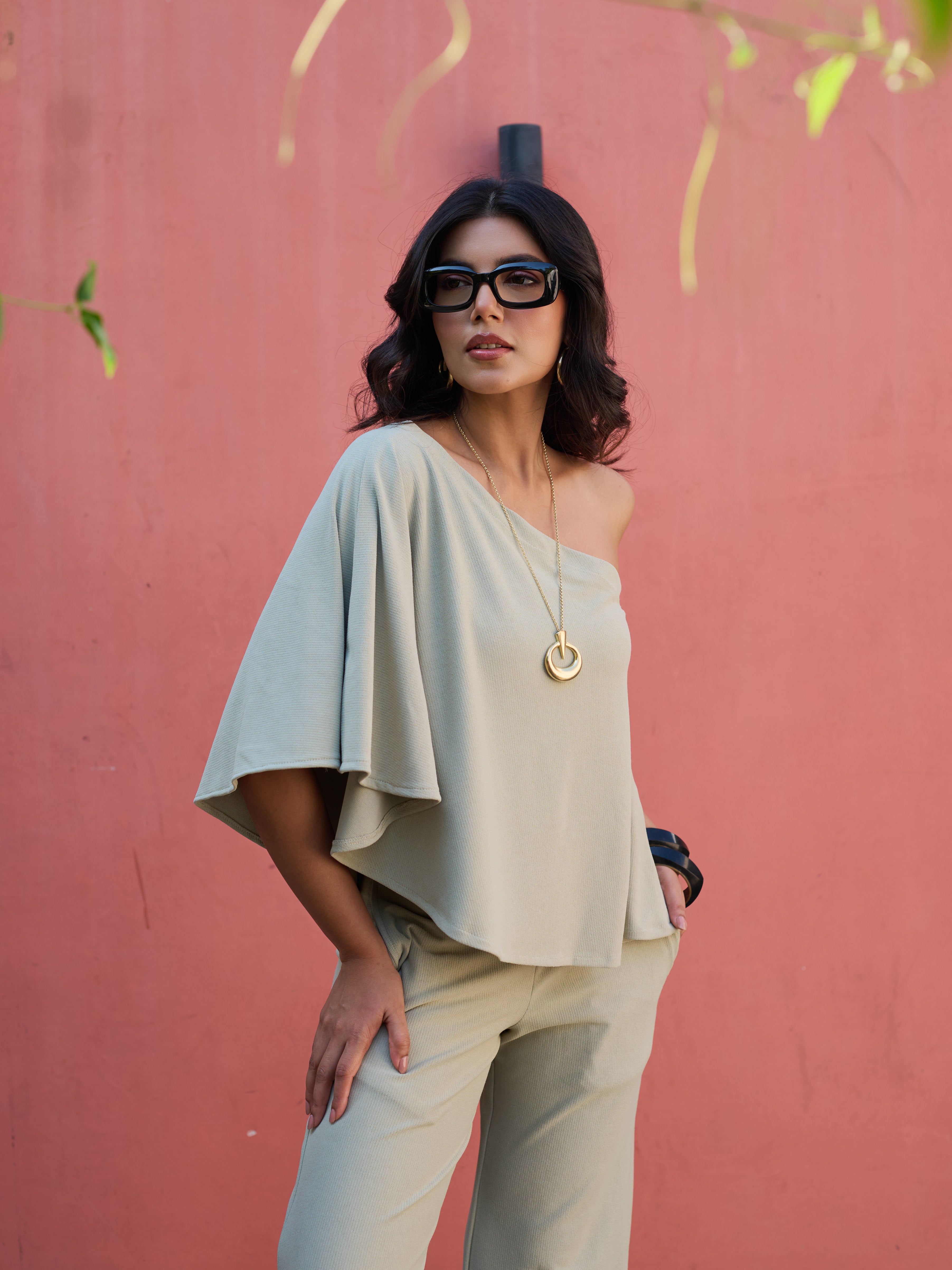 The Elite One-Shoulder Coord in a soft Sage Green