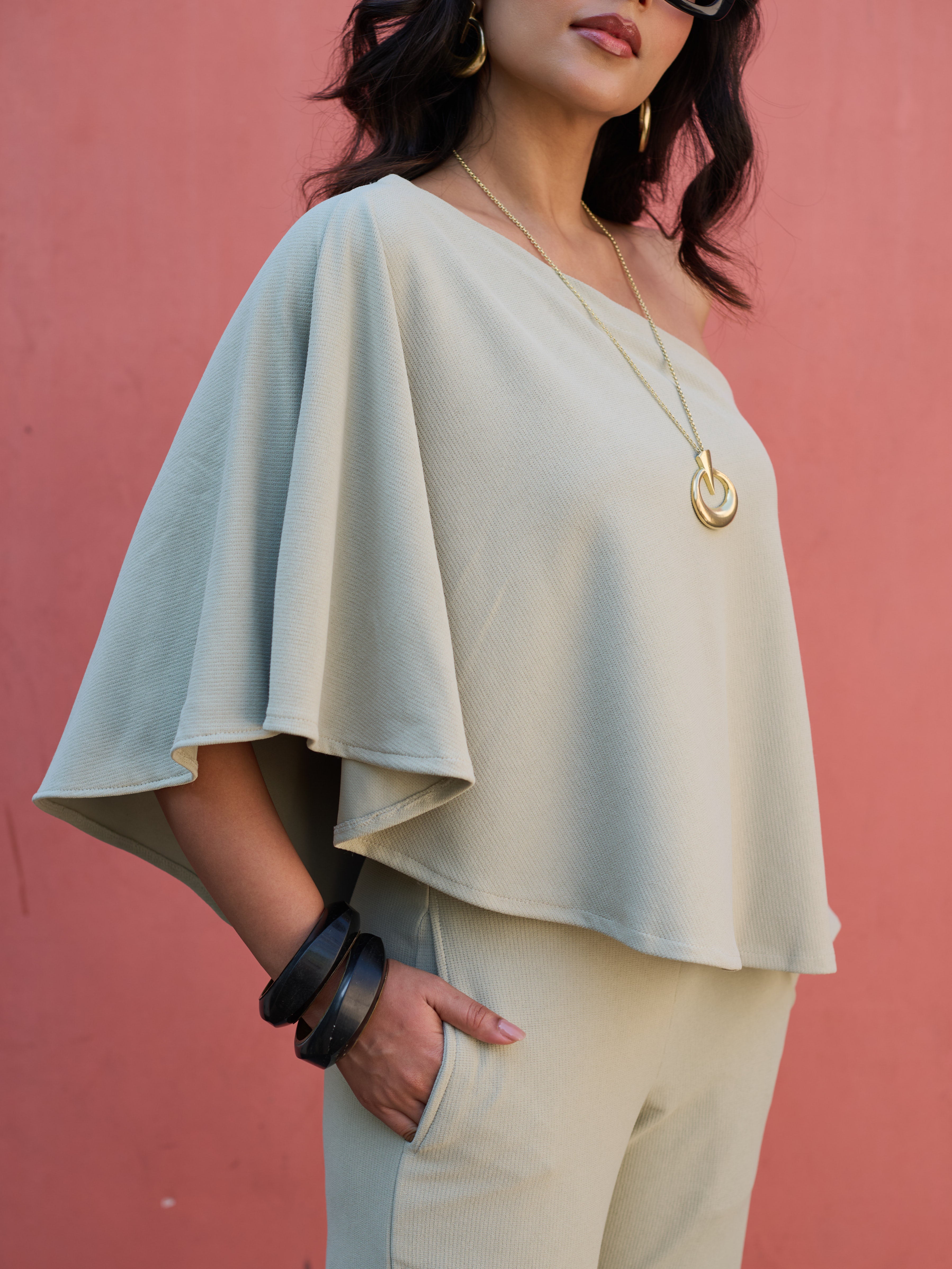 The Elite One-Shoulder Coord in a soft Sage Green